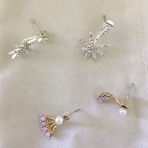 Two pairs of earrings- 1 silver tone and 1 gold